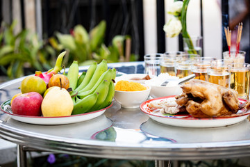 Stream chicken, fruit, dessert and drink for Sacrificial offering