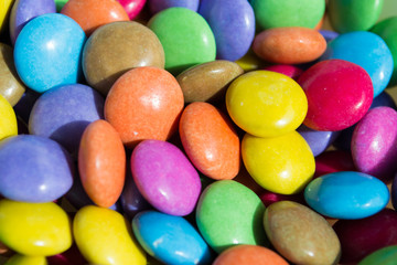 Fototapeta na wymiar Multi-colored sweets, jelly beans background.