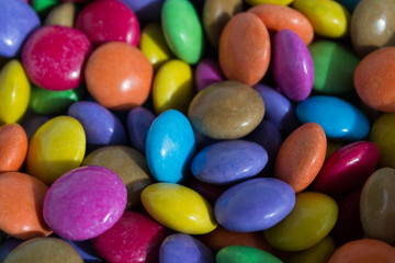 Fototapeta na wymiar Multi-colored sweets, jelly beans background.