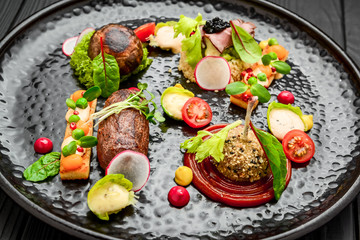 Beautifully decorated catering banquet table with different food snacks