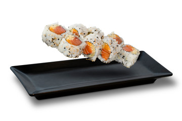 Isolated on white background of Sushi Rolls with Salmon, Crunchy, Tempura, Spicy Mayo Sauce, Japanese food. Clipping path Included.