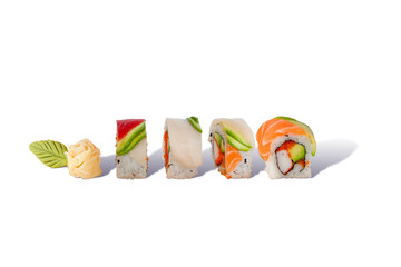 Colorful Sushi Rolls with Bluefin Tuna White Tuna Salmon and Avocado on top Isolated on White Background, Clipping Path on the main object (not the shadow) Included. Japanese Food.
