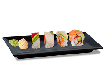 Colorful Sushi Rolls with Bluefin Tuna White Tuna Salmon and Avocado on top Isolated on White Background, Clipping Path on the main object (not the shadow) Included. Japanese Food.