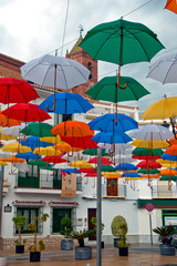Fototapeta na wymiar Colorful Umbrellas Plaza de la Constitucion Torrox Costa Del Sol Andalusia Spain