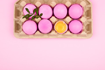 Pink eggs top view. Place for an inscription. White sheet for writing wishes for Easter. minimalistic trend, top view. Easter concept.