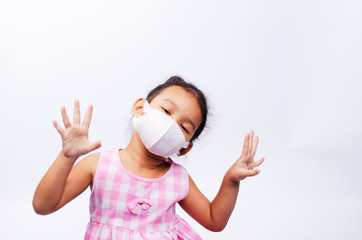Asian kids wearing mask for protect pm2.5 and COVID-19 or coronavirus on white background