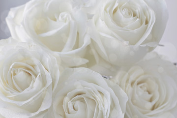 bouquet of white roses and boke