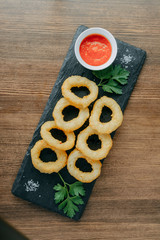 Homemade Crunchy Fried Onion Rings with Ketchup