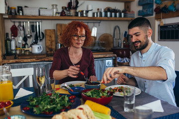 family lunch party at home. vegetarian meal