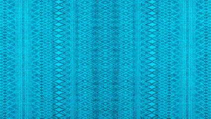 Geometric blue woven cotton textile with diamond rhombus pattern texture background