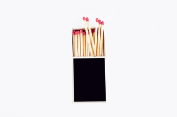 Black matchbox isolated on white, top view