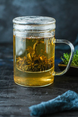 green tea large leaf freshly brewed (aromatic drink) menu concept background. top view. copy space