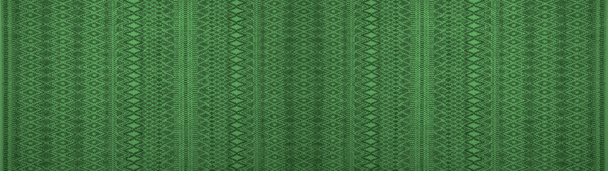 Geometric green woven cotton textile with diamond rhombus pattern texture background banner panorama
