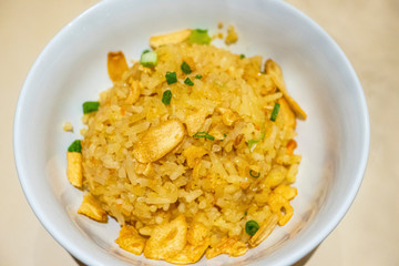 Garlic fried rice with vegetable in a bowl