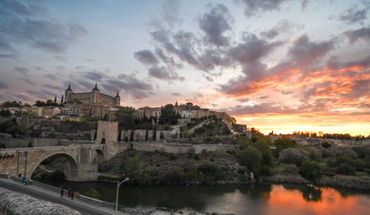 Fototapeta na wymiar Panoramic view of Toledo at sunset, with the Alcazar de Toledo in the background
