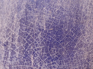 Purple ceramic surface for background.