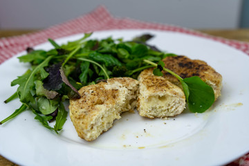 Homemade steam cutlets with salad mix for garnish, healthy food