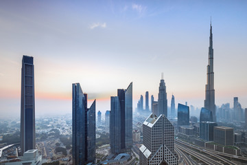 Fototapeta na wymiar Dubai city skyline at sunset, United Arab Emirates