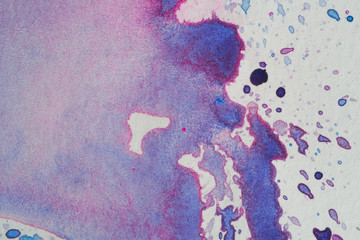 stain watercolor background with a splattered sheet of paper. paint with droplets of paint splashes of multi-colored blue-purple