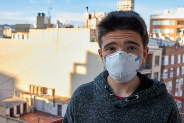 teenage with coronavirus protection mask