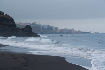 Beach with black volcanic sand