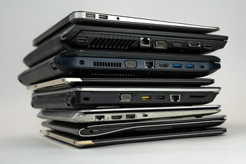 Stack of laptops on top of eachother.