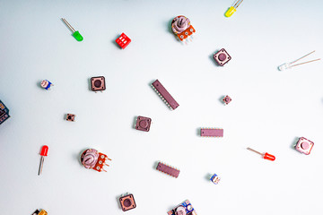 Micro electronics arduino DIY components on a light background, top view