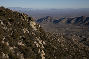 Panorama shot of Tucson Arizona desolate desert mountain ranges as seen from Kitt Peak Observatory 