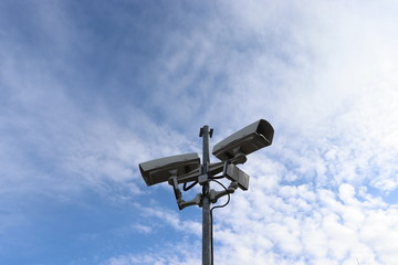 cctv camera under blue sky view