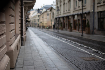 Fototapeta na wymiar Old european town blurred background