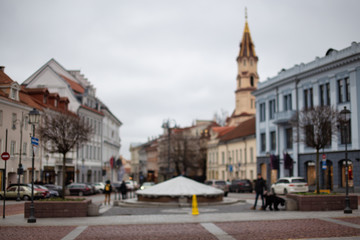 Fototapeta na wymiar Blurred background of european city Vilnius old town