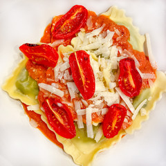 Cheese ravioli with fresh parmesean and roasted grape tomatoes