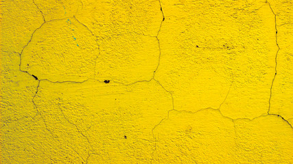 Yellow abstract background with concrete texture