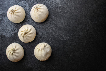 khinkali or dumplings with filling, menu concept background. top view. copy spaces