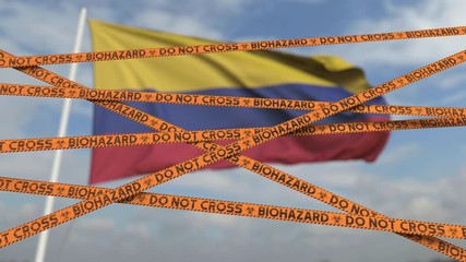 Do not cross biohazard tape lines on the Colombian flag background. Restricted entry or quarantine in Colombia. Conceptual looping 3D animation - Powered by Adobe