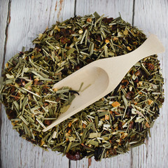 Loose leaf herbal tea with scoop