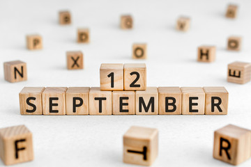 September 12 - from wooden blocks with letters, important date concept, white background random...