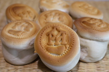 Prosphora, Prosper, is the church bread used for communion in the Orthodox Church. Whole and sliced.