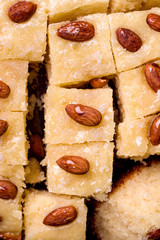 Oriental cuisine pie with semolina. Basbus pie texture closeup