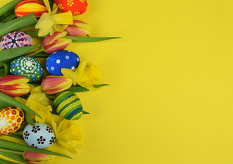 Happy Easter - painted eggs on colored background