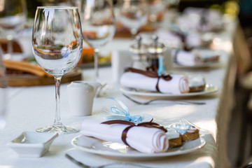 Served for banquet restaurant table with dishes, snack, wine glasses