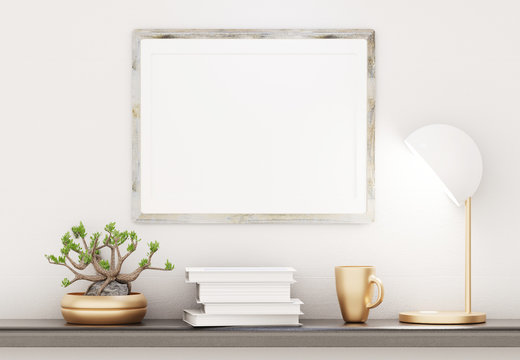 The template of an empty frame on the wall above the shelf. Lamp, bonsai and books on the shelf. The white wall in the background. 3D rendering. © SrgSie