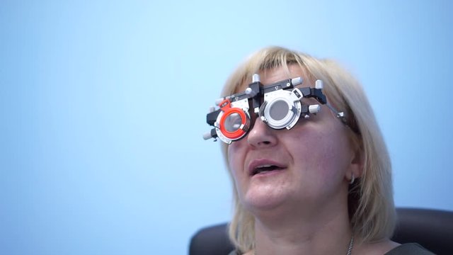 The doctor checks the eyesight of the patient. Foropter electronic automatic. Eye clinic. Health prophylaxis.