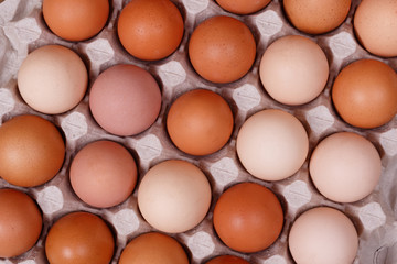 Village eggs. Kraft paper background