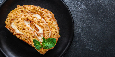 biscuit cake roll (delicious sweet honey dessert) menu concept. background. top view. copy space