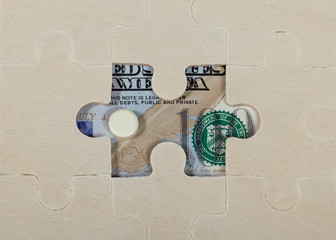 Puzzle piece, pill, money concept