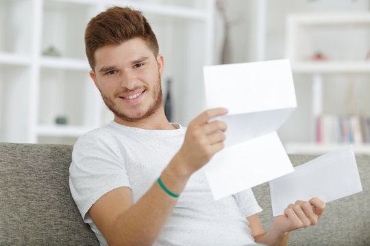 Attractive Young Man Excited About Some Good News