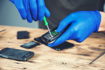 man worker to repair smart phone