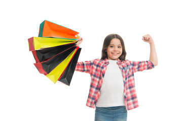 Shopping is my superpower. Happy child with paper bags. Little girl smile with shopping bags. Holiday preparation and celebration. Shopping and sale on black friday. Seasonal discount. Bachelor day