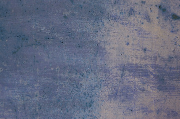 Background. The metal surface of the garage, covered with purple paint.